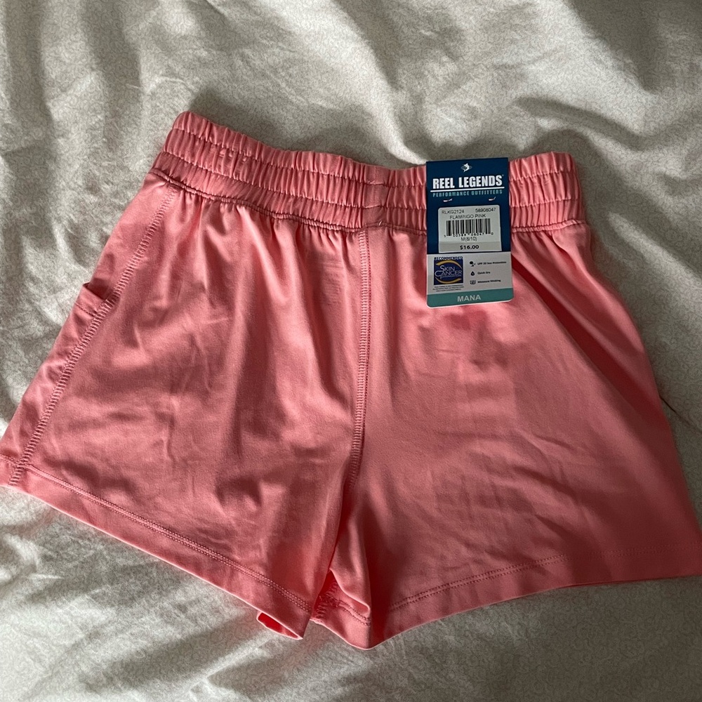 NWT Reel Legends flamingo pink girls shorts. M8/10. 88%poly, 12% spandex.
